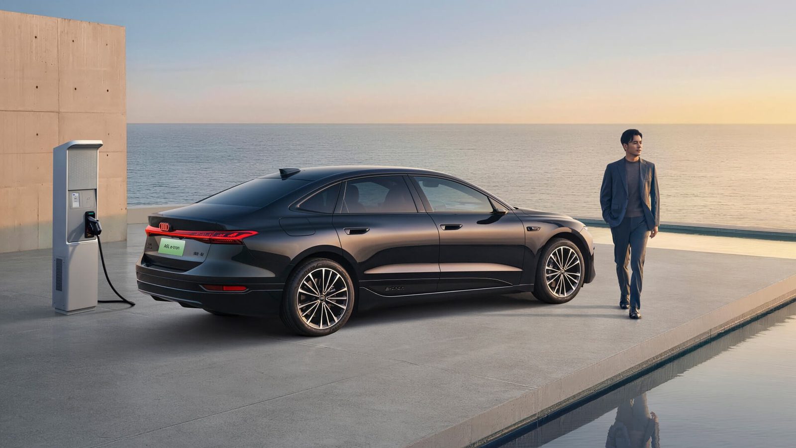 Audi A6L e-tron China 2025 — экстерьер, rear 3q charging, рынок China